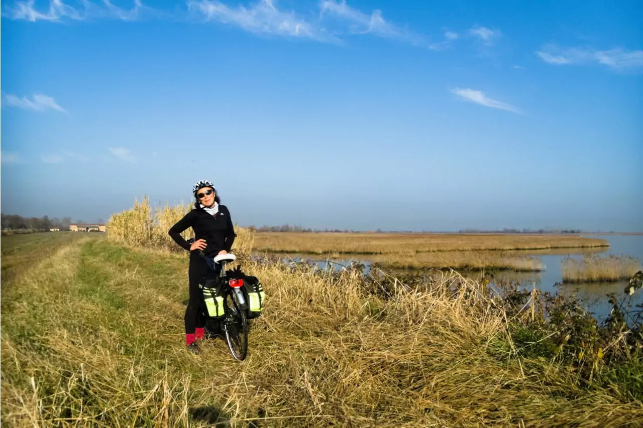 Cyclist on the new cycle path that runs along the Marano Lagoon